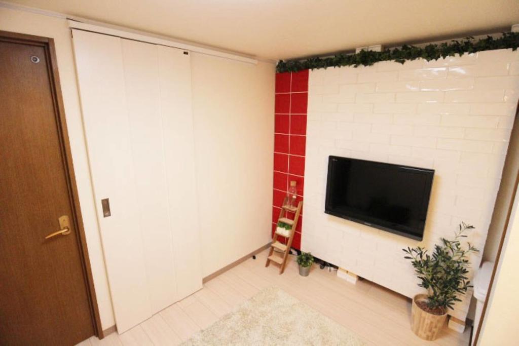 Hotel The Neighbors Tsukamoto Osaka Esterno foto